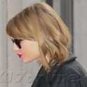 Taylor Swift Rocks Her Signature Red Lips