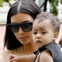 Kim Kardashian Takes Nori Out And About In Paris