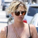 Kaley Cuoco Goes Shirtless For Yoga!