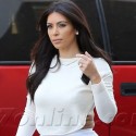 Kim Kardashian Flaunts Her Bra In Backless Outfit