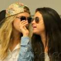 Selena Gomez And Cara Delevigne Arrive At LAX