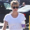 Kaley Cuoco Gasses Up Her Range Rover In Baggy Jeans