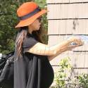 Kourtney Kardashian Shows Off Her Babu Bump In A Black Dress