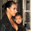 Kim Kardashian Hangs On Tight To Daughter Nori