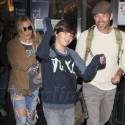LeAnn Rimes Touches Down In Ripped Jeans At LAX