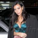 Kim Kardashian Wears A Sexy Satin Outfit