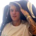 Justin Bieber Covers Up His Ratty Locks