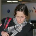 Pregnant Zooey Deschanel Catches A Flight With Fiance Jacob Pechenik