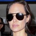 Angelina Jolie Travels With Son Maddox And Brother Haven