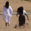 Kylie Jenner Falls In The Sand After Kendall Pushes Her
