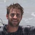 Liam Hemsworth Flashes Some Skin In Malibu
