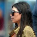Pregnant Kim Kardashian Shows Off Her Milk Jugs As She Arrives In France
