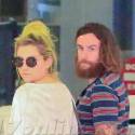 Kesha Cozies Up WIth Her Boyfriend At LAX