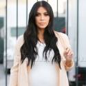 Kim Kardashian Flaunts Her Pregnant Belly In A Skintight Dress