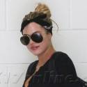 Khloe Kardashian Tames Her Hair With A Bandana At The Gym