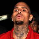 Chris Brown Rolls In Red