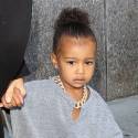 North West Looks Fashion Forward In Gold Chains And Leather Leggings