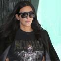 Kim Kardashian Wears Thigh High Boots On Shopping Spree In NYC