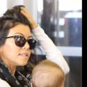 Kourtney Kardashian Looks Stressed As She Jets Out Of L.A. With Baby Reign Amid Drama