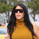 Kim Kardashian Rocks A Clingy Burnt Orange Dress And Burgundy Heels