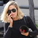 Khloe Kardashian Wears Purple Running Shoes To Her Workout