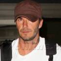 David Beckham Arrives At LAX And Signs Autographs For Fans