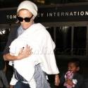 Charlize Theron Cruises Through LAX With Her Kids