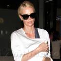 Charlize Theron Bundles Up Baby August At LAX