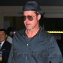 Brad Pitt Arrives At LAX In Head To Toe Blue