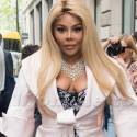 Lil Kim Lets It All Hang Out At Paris Fashion Week