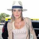 Khloe Kardashian Catches A Flight As Romance With Tristan Thompson Heats Up