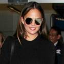 Chrissy Teigen And John Legend Roll Through LAX With Little Luna