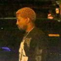 Kanye West Looks Down In The Dumps At Dinner