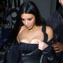 Kim Kardashian Sports Insane Cleavage In A Pinstripe Dress