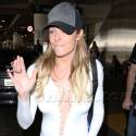 Leann Rimes Ditches Her Bra At The Airport