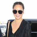 Chrissy Teigen Catches A Flight Out Of LAX