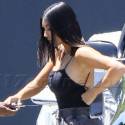 Kim Kardashian Flaunts Her Tiny Waist In A Bodysuit And Sweatpants