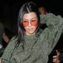 Kourtney And Khloe Catch A Flight At LAX