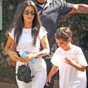 Kourtney Kardashian Bares Her Midriff In White Tracksuit