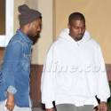 Kanye Catches A Movie With Pal Kid Cudi