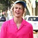 Justin Bieber Shows His Wacky Fashion Sense In A Pink Shirt With Matching Socks And Shower Slides