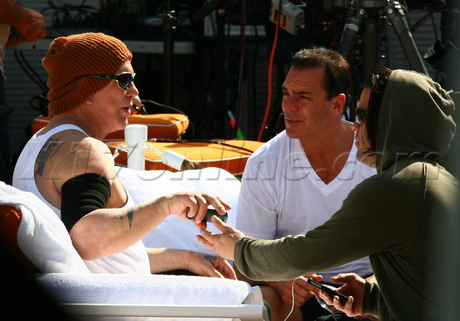 Mickey Rourke shades beanie 