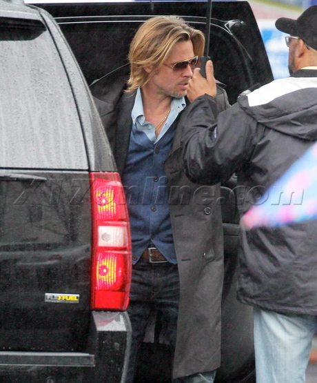Brad Pitt oscar rain umbrella beverly hills hotel