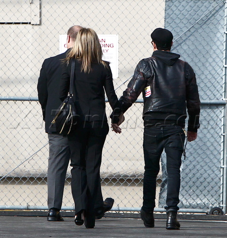 Jennifer Aniston Justin Theroux sunglasses leather couple holding hands 