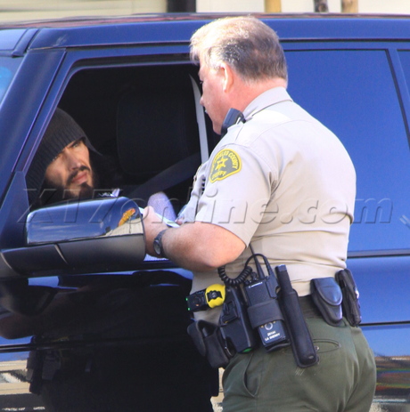 sunglasses Russell Brand car speeding ticket police