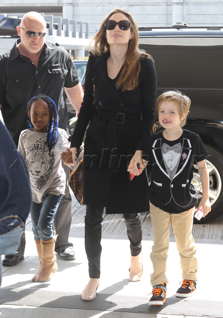 sunglasses Angelina Jolie braids Zahara Shiloh lax car trench