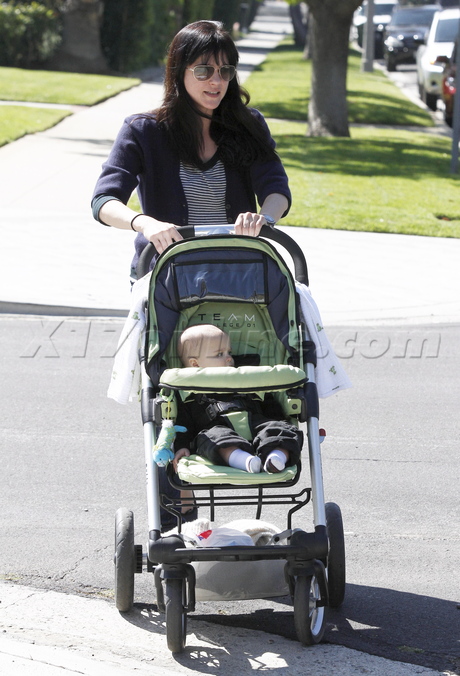 Selma Blair denim stroller sunglasses wave smile baby 