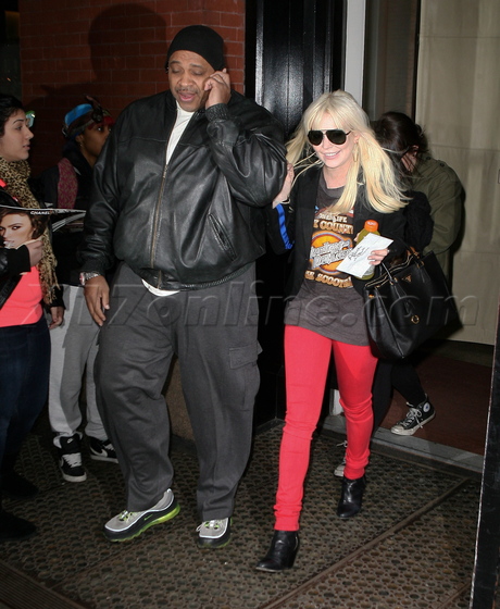 blonde red pants plastic surgery sunglasses jacket purse smile alice and olivia saturday night live 