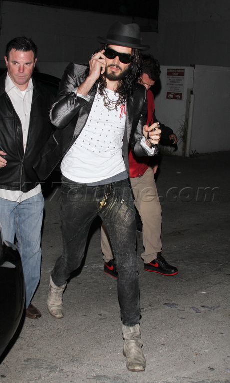 Russell Brand hat sunglasses jeans boots largo
