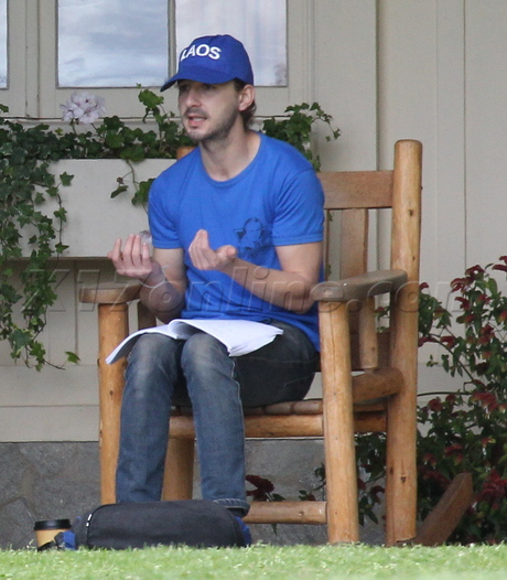 Shia LaBeouf hat beard jeans script smoking cigarette 